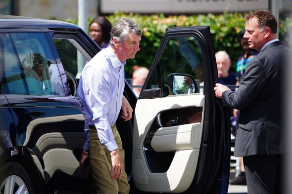 Sir Tim Laurence leaves car