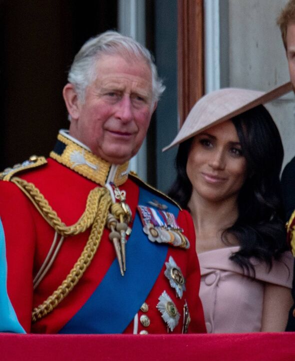 Meghan Markle and King Charles on balcony