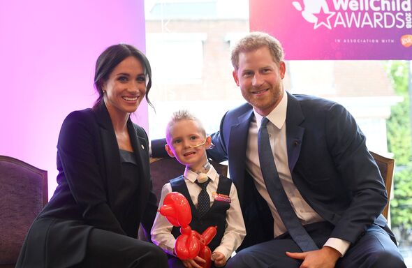 Prince Harry and Meghan Markle meet Mckenzie Brackley at the WellChild awards in 2018