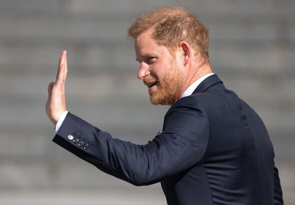 Prince Harry waves to crowd