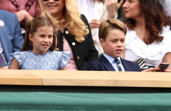 Princess Charlotte of Wales and Prince George of Wales are seen in the Royal Box ahead of the Men's Singles Final between Novak Djokovic of Serbia and