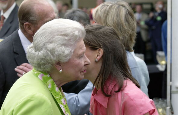 Queen kisses Lady Sarah on cheek