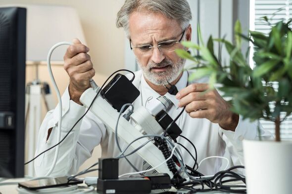 Man with a power cord