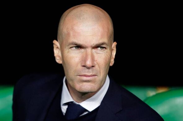 Zinedine Zidane looks on