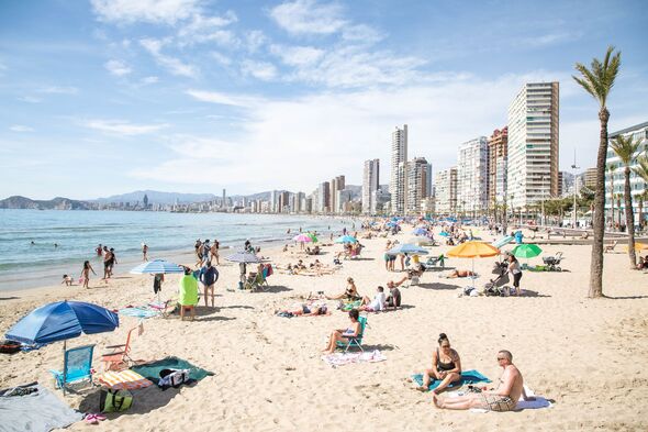 spain british tourists fine benidorm beach game