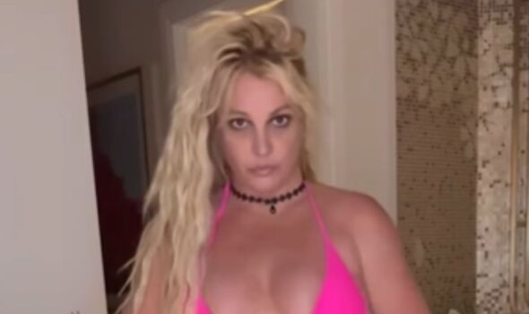 Britney dancing in a tiny pink bikini