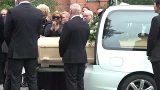 Nancy Dell’Olio places rose on Sven-Goran Eriksson’s coffin at funeral