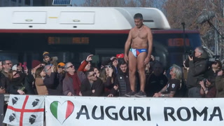 Italians dive into icy waters of Rome’s Tiber River for New Year’s