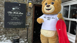 Dozens of people snowed in a Britain’s highest pub