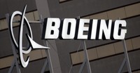 The Boeing logo is displayed in El Segundo, Calif., on Jan. 25, 2011. (AP Photo/Reed Saxon, File)