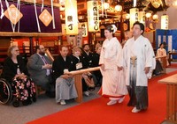 Colleen Schmuckal smiles at attendees after her Shinto-style wedding ceremony with Toshikazu Hashimoto, in the city of Kazuno, Akita Prefecture, on Sept. 22, 2024. (Hikoshi Tamura)