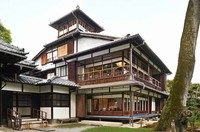 The three-story main building with the impressive watchtower is seen at the Old Mitsui Family Shimigamo Villa in Kyoto's Sakyo Ward on Sept. 5, 2024. It is built as if nestling up to a muku tree that has been there before the structure was relocated. (Mainichi/Kazuki Yamazaki)