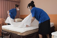 In this unrelated file photo, Vietnamese technical interns make a bed at a hotel in Marugame, Kagawa Prefecture, on July 30, 2023. (Mainichi/Haruna Okuyama)