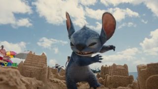 Stitch destroying a sandcastle in Lilo & Stitch live-action trailer