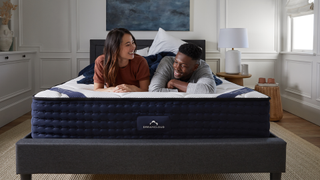 A couple on a DreamCloud mattress