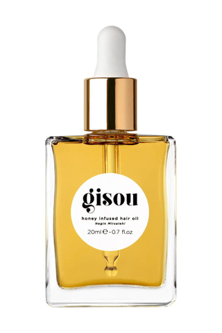 Gisou Mini Honey Infused Hair Oil on a white background