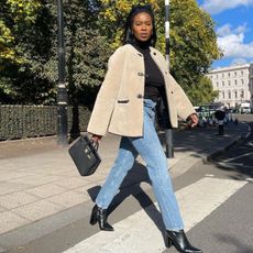 @nlmarilyn wearing Mango shearling coat