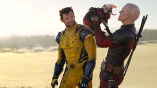 (L-R) Wolverine (Hugh Jackman) next to Deadpool (Ryan Reynolds) holding Dogpool in "Deadpool & Wolverine".