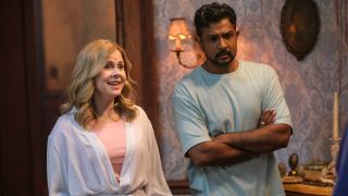 Pictured (L-R): Rose McIver smiling as Samantha and Utkarsh Ambudkar looking concerned with his arms crossed as Jay.