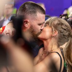 Travis Kelce #87 of the Kansas City Chiefs celebrates and kisses Singer Taylor Swift following the NFL Super Bowl 58 football game between the San Francisco 49ers and the Kansas City Chiefs at Allegiant Stadium on February 11, 2024 in Las Vegas, Nevada.