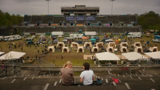 A shot of a football stadium turned into a camp in Civil War