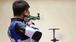 Zhang Changhong representing China in the 2020 Tokyo Olympic shooting events.