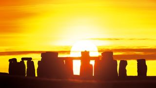 Stonehenge silhouetted against the setting sun. Taken on December the 22nd, winter solstice.