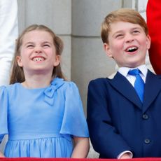 Prince George and Princess Charlotte stand on the Buckingham Palace balcony for Trooping the Colour