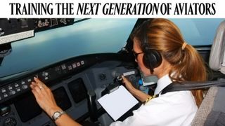 A woman in the cockpit of an airplane