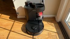 Yeedi C12 Pro Plus robot vacuum and base station in reviewer's home