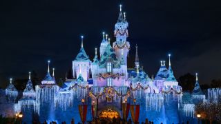 Sleeping Beauty Castle at Disneyland in Christmas lights.