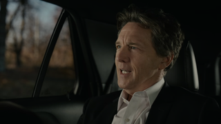 Andrew McCarthy as Edward The Pilot sitting in a car and smiling on The Blacklist