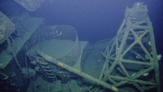 Researchers dive to the wreck of the WW II-era aircraft, the USS Independence.