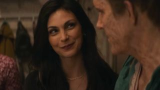 Morena Baccarin smiles sweetly at Ryan Reynolds in Deadpool & Wolverine.