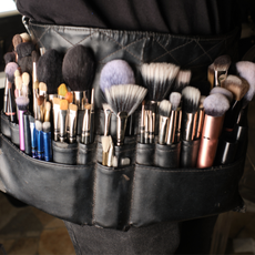 a make-up artists make-up brush belt showcasing one of the Best make-up brush sets