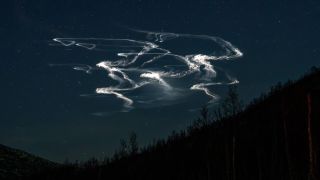 colorful wisps of light in the night sky