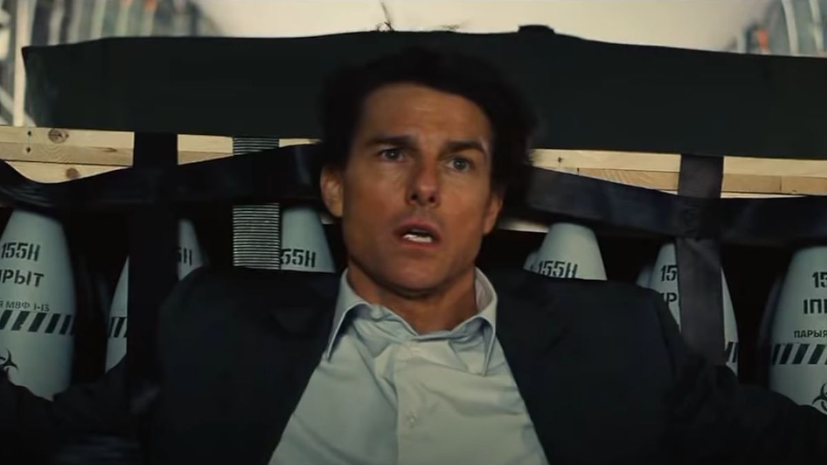 Tom Cruise up against a pallet of bombs in Mission: Impossible - Rogue Nation.