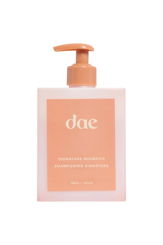 Dae Signature Shampoo on a white background
