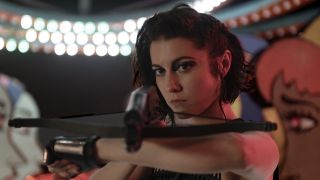 Mary Elizabeth Winstead holding crossbow in Birds of Prey