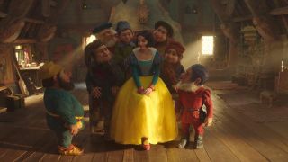 Rachel Zegler's Snow White surrounded by the seven dwarfs