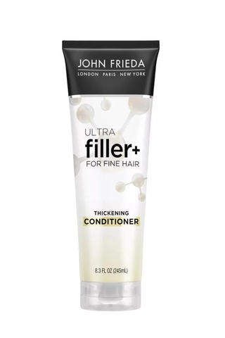 John Frieda conditioner on a white background