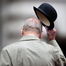 london, england august 2 prince philip, duke of edinburgh raises his hat in his role as captain general, royal marines, makes his final individual public engagement as he attends a parade to mark the finale of the 1664 global challenge, on the buckingham palace forecourt on august 2, 2017 in london, england photo by hannah mckay wpa poolgetty images