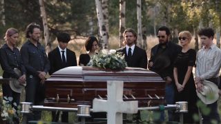 Screenshot of Yellowstone characters at John's funeral burial in Yellowstone Season 5 finale