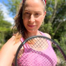 Anna learning how to play tennis as a beginner