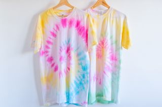 Homemade tie dye t-shirts with a spiral pattern.