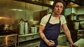 Jeremy Allen White stands in a kitchen in the Bear season 3