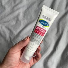 valeza holding the Cetaphil PRO Tinted Moisturising Day Cream