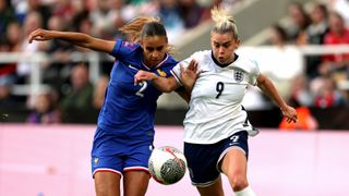 Maelle Lakrar and Alessia Russo fight for the ball during the UEFA Women's EURO 2025 qualifying match between England and France