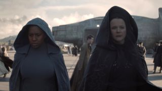 Jade Anouka and Emily Watson walk together while wearing hooded cloaks in Dune: Prophecy - S1 E2 - "Two Wolves."