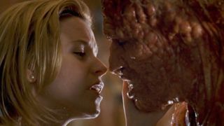 Elizabeth Banks and Michael Rooker in Slither